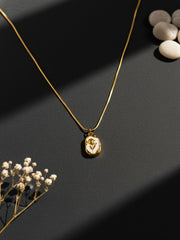 Golden Petal Oval Necklace