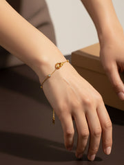 Golden Knot Charm Bracelet